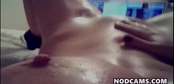  Busty blonde rubs her big oily tits & pussy